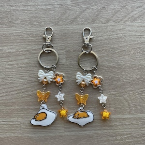 Orange egg charm beaded keychain