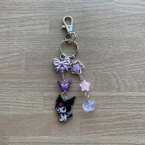 Black purple white rabbit charm beaded keychain
