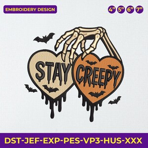 May include: An embroidery design featuring two heart-shaped designs with the words "STAY CREEPY". A skeleton hand holds the hearts, with bats and dripping accents. The design is available in 4", 5", 6", and 7" sizes.