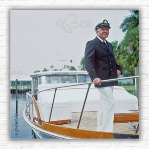 Stampa/poster di Slim Aarons Oxley On Boat - John Oxley a bordo di un motoscafo, Boca Raton, Florida, aprile 1978.