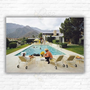 Stampa/poster "Interruzione a bordo piscina di Slim Aarons" - Lita Baron alla festa di Nelda Linsk a Palm Springs, Desert House di Richard Neutra, California