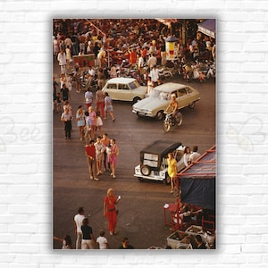 Slim Aarons  Saint-Tropez Print/Poster - Cars and pedestrians on the busy seafront at Saint-Tropez, in southeastern France, September 1970.