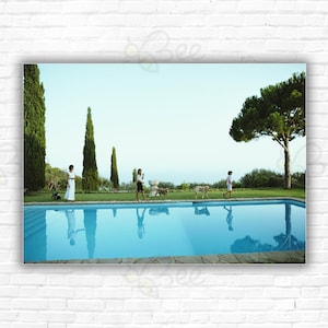 Stampa/Poster di Slim Aarons Roca Llisa - Fosca, Vera e Fiona Bertran in vacanza a Roca Llisa, sull'isola di Ibiza, Spagna, 1978.