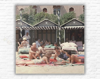 Slim Aarons  Beach Backgammon Print/Poster - Backgammon on the beach at the Hotel Excelsior on the Venice Lido, Italy, 1957.