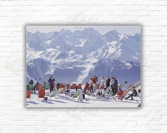 Slim Aarons Lounging In Verbier Print/Poster - Holidaymakers in sun loungers on the slopes at Verbier, Switzerland, February 1964.