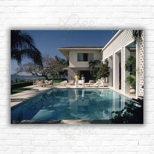 Slim Aarons Acapulco Pool Print/Poster -  Architect Arturo Pani & his wife by their swimming pool at home in Acapulco, Mexico Aaron Photo