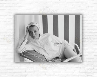 Slim Aarons  Cool Capucine Print/Poster - 1955: French actress Capucine, (Germaine Lefebvre) (1933 - 1990) reclining wearing a head scarf.