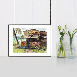 May include: A watercolor painting of a small wooden shack with a sign that reads "Irie Vibes". The shack is surrounded by lush greenery and a palm tree. The painting is framed in black.