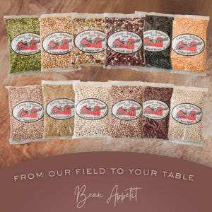 May include: An assortment of packaged dried beans, including green split peas, cannellini beans, and black beans. Each package has a label with the text "Carlson-Arbogast Farm Bean Appetit". The image also includes the text "From our field to your table" and "Bean Appetit".