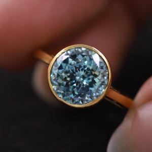 Solitaire Moissanite Engagement Ring, Portuguese Round Cut Anniversary Ring, Cyan Blue Diamond Wedding Ring, Bezel Set Proposal Ring