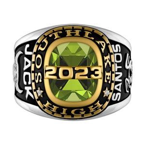 May include: A silver and gold class ring with a green gemstone and the inscription "Jack Santos High 2023".