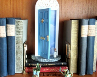 Blue Fairy Door or Tooth Fairy Door, opens outward , with architectural detail, two tiny envelopes and stationery