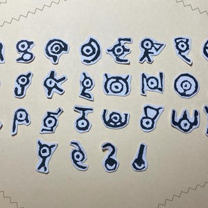 Set di adesivi Pokemon Unown (stampati a mano; set da 28)