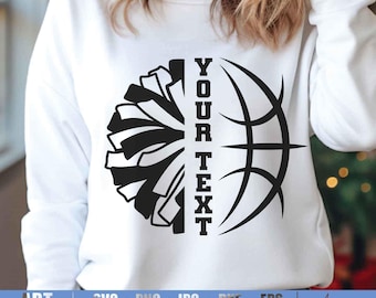 May include: White sweatshirt with a black design of a cheerleading pom-pom and a basketball. The text "YOUR TEXT" is written vertically in the center of the design.