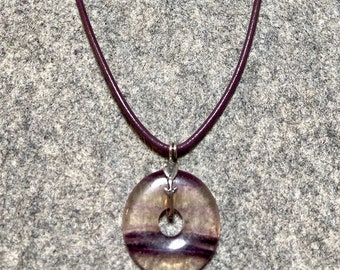 Purple Fluorite Gem Donut with Sterling Rose Bail on Purple Leather Cord