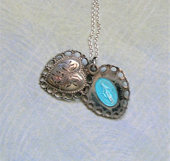 Vintage Sterling Sliding Religious Heart Pendant With… Gem