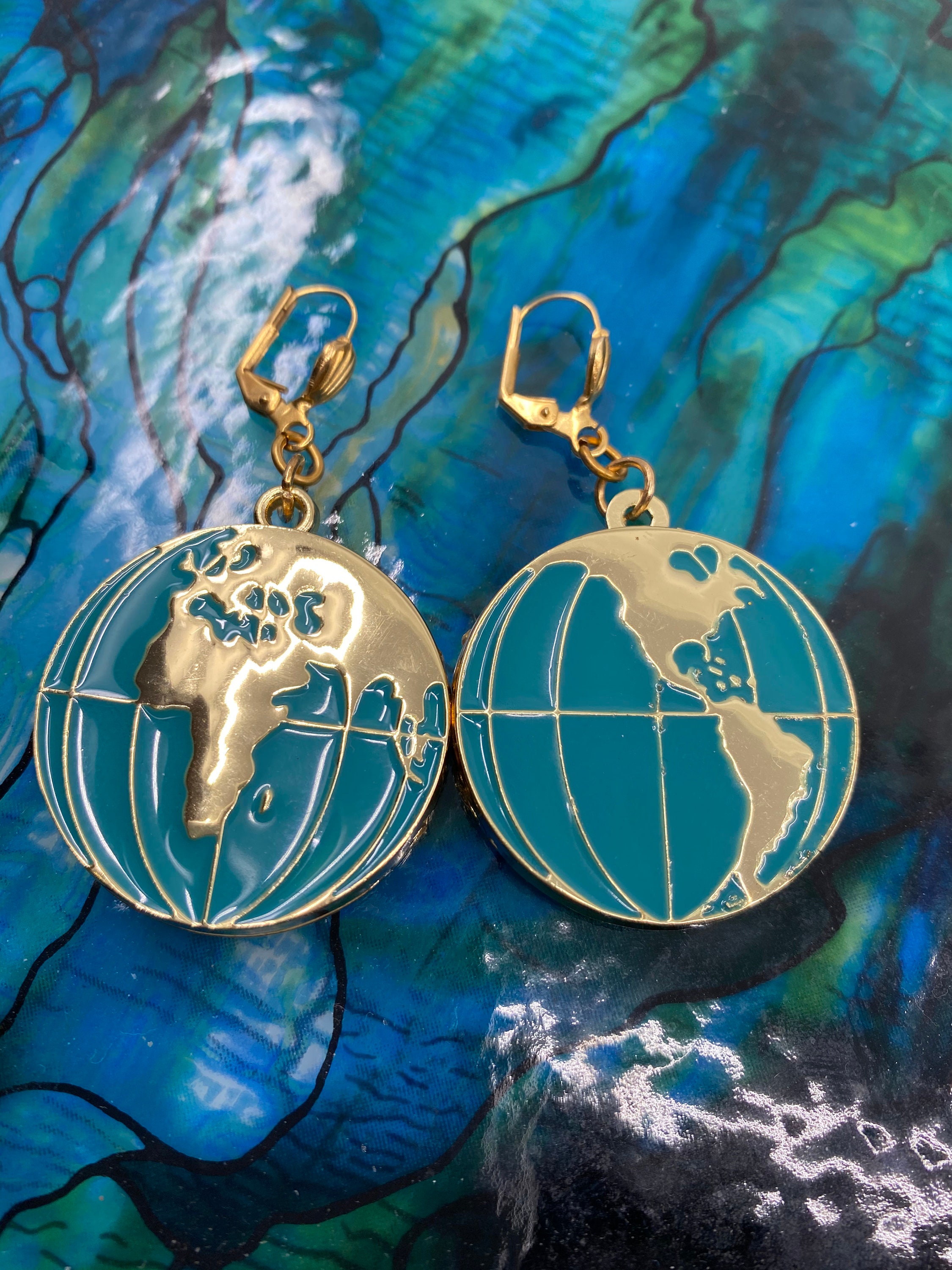 World globe earrings sale
