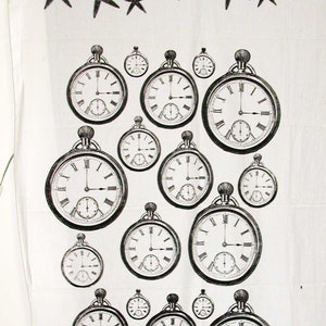 May include: A white fabric background with a black and white pattern of stars and pocket watches. The pocket watches have roman numerals and are arranged in a cascading pattern.