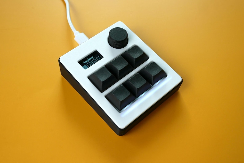 TogKey Pad Plus: Mini teclado con macropad programable de 6 teclas / Perilla de volumen / Pantalla OLED / Iluminación RGB / Interruptores mecánicos intercambiables en caliente / QMK Panda