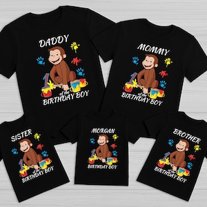May include: Black t-shirts with a cartoon monkey design, text, and colorful paint splatters. The shirts are labeled "Daddy", "Mommy", "Sister", "Morgan", and "Brother" with "of the Birthday Boy" text.