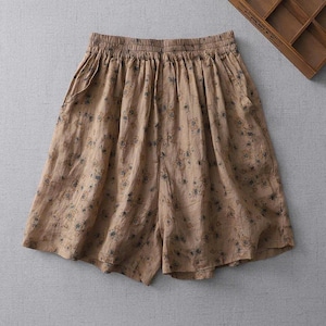 Short rétro fleuri en lin et coton : pantalon large à taille élastique