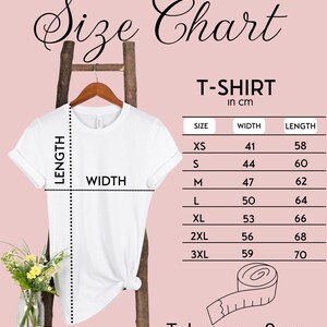 May include: White t-shirt size chart with measurements in centimeters for XS, S, M, L, XL, 2XL, and 3XL. The chart shows the width and length of each size. Toleranz: &plusmn; 2 cm.