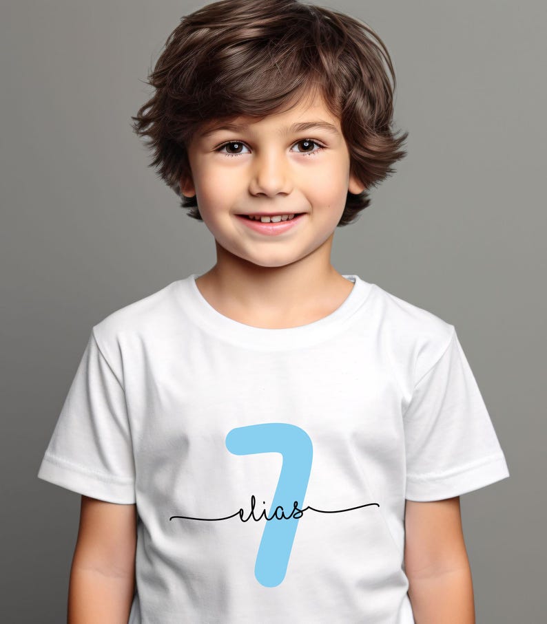 May include: A white t-shirt with a blue number seven and the name "Elias" written underneath.