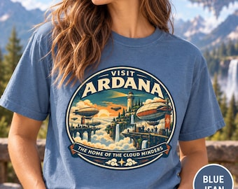 Visit Ardana retro airship travel poster T-shirt | Cloud Kingdom skyline design