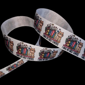 May include: White ribbon featuring a repeating pattern of a cat wearing glasses, books, and the text "I HAVE NO SHELF CONTROL." The ribbon is ideal for crafting, gift wrapping, or adding a decorative touch to various projects.