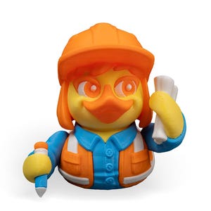 May include: A yellow rubber duck wearing an orange construction hat, a blue shirt, and an orange safety vest. The duck is holding a blue pencil in one hand and a white rolled-up blueprint in the other.
