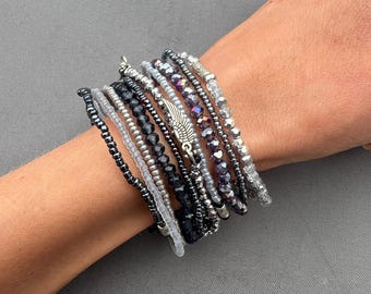 Boho Layered Beaded Stretch Bracelet Set: Black, Silver & Angel Wing