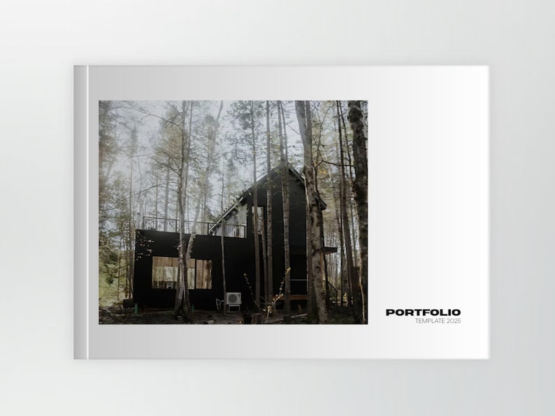 May include: A black cabin nestled among tall trees, with a white border. The cabin has a modern design with large windows and a balcony. The image is part of a portfolio template, as indicated by the text on the right.