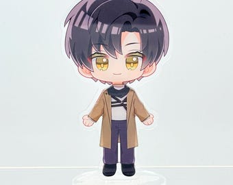 May include: A clear acrylic figure of a cartoon character with black hair, yellow eyes, and a tan coat over a white shirt and purple pants. The figure is standing on a clear base.