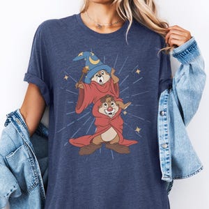 May include: A white, distressed wooden sign with the word "Welcome" in a handwritten font. It features a small heart detail. Ideal for a front door or entryway. The sign is handmade.