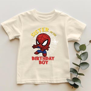 a white shirt with a spider - man birthday boy on it