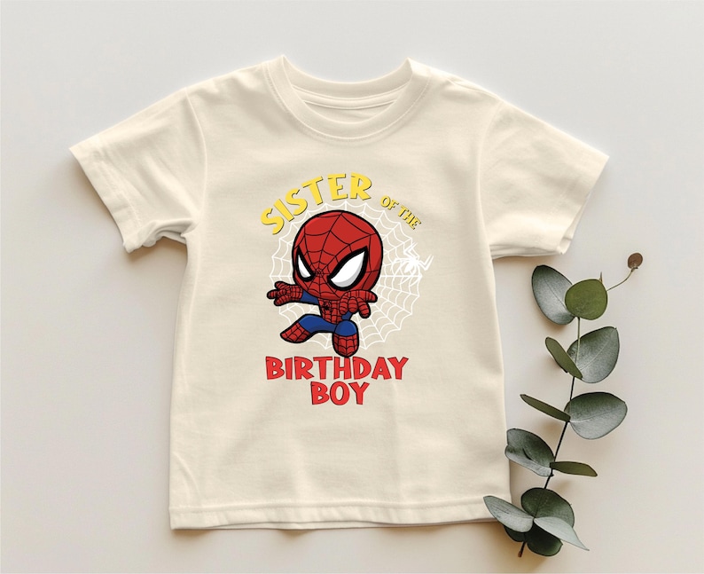 a white shirt with a spider - man birthday boy on it