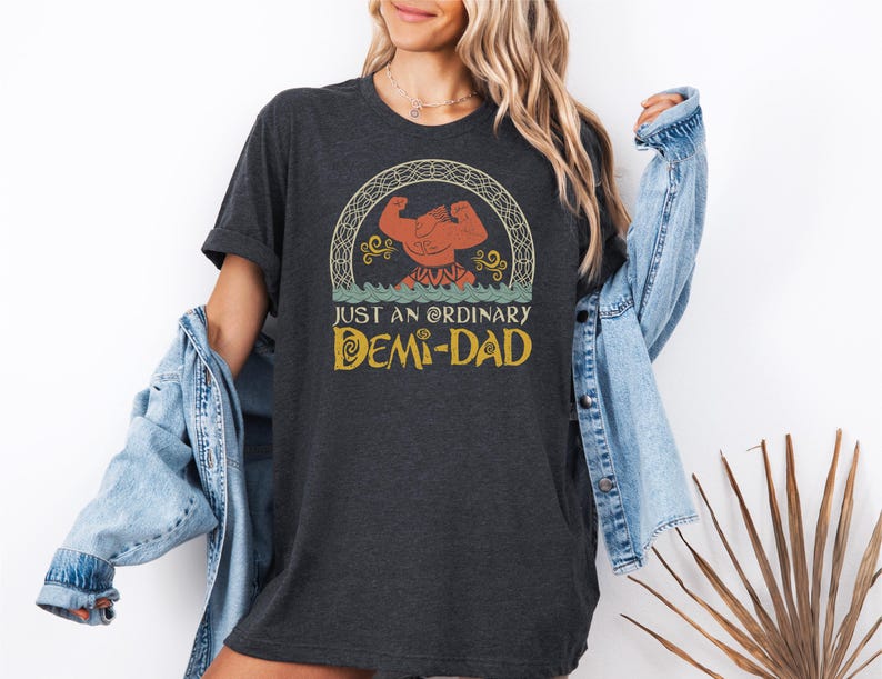 a woman wearing a t - shirt that says, just an ordinary dem - dad