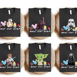 a set of four star wars t - shirts sitting on top of a wicker