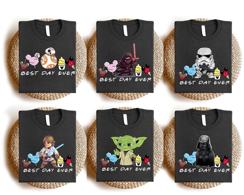 a set of four star wars t - shirts sitting on top of a wicker