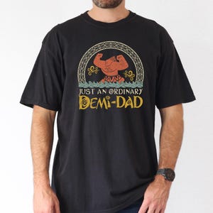 a woman wearing a t - shirt that says just an ordinary dean - dad