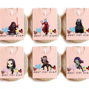 four pink t - shirts with cartoon characters on them