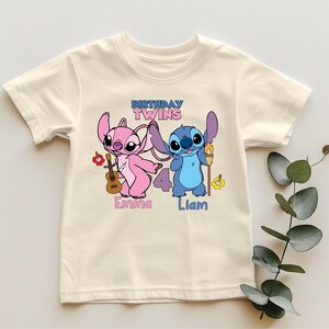 a t - shirt with a picture of two cartoon characters on it
