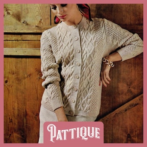 May include: A beige, button-down cardigan sweater with intricate cable knit and textured patterns. The sweater has a round neckline and long sleeves. The image includes the text "PATTiQUE" in a decorative font.