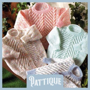 May include: Four knitted baby sweaters in different colors, including pink, blue, and white. The sweaters have a cable knit pattern and a delicate lace design.