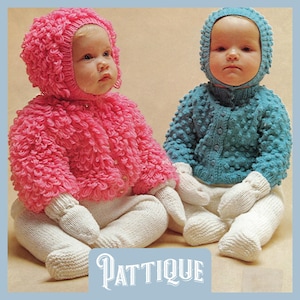 May include: Two knitted baby outfits, one in pink and one in blue. Both outfits feature a matching hat and mittens. The pink outfit has a fluffy texture, while the blue outfit has a textured bobble design. The outfits are photographed on a light brown background.