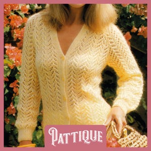 May include: A yellow knitted cardigan with a V-neck and button closure. The cardigan has a delicate openwork pattern and is shown being worn by a model.