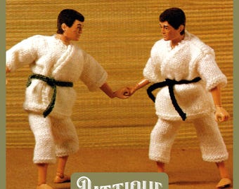 May include: Two figures wearing white karate uniforms with black and green belts, standing in a fighting stance with their hands clasped together.