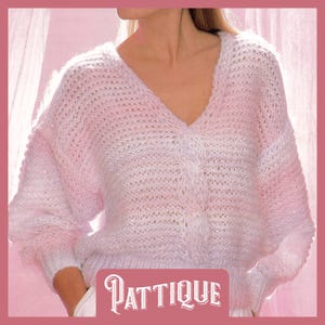 May include: A pink and white knitted jumper with a V-neck and long sleeves. The jumper has a loose, relaxed fit and is made of a soft, lightweight yarn.
