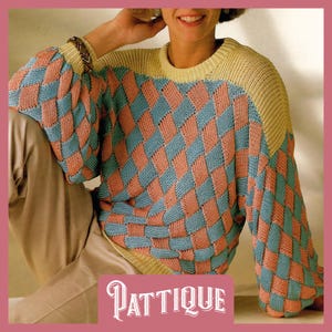 May include: A knitted sweater with a diamond pattern in shades of pink and blue. The sweater has a yellow trim around the neck and shoulders. The word "PATTIQUE" is printed on the bottom of the image.