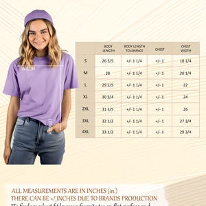 The image is a size chart for a purple t-shirt, featuring a smiling woman wearing the shirt and measurements for different body types.